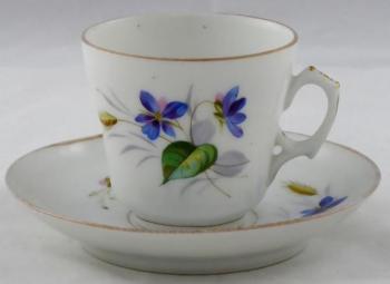 Kaffeetasse mit blauen Blumen, Kolben und Blttern
